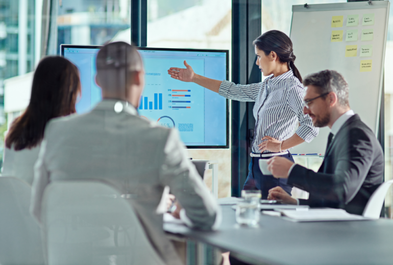 A serious, data-driven moment where expertise is clearly leading the conversation.